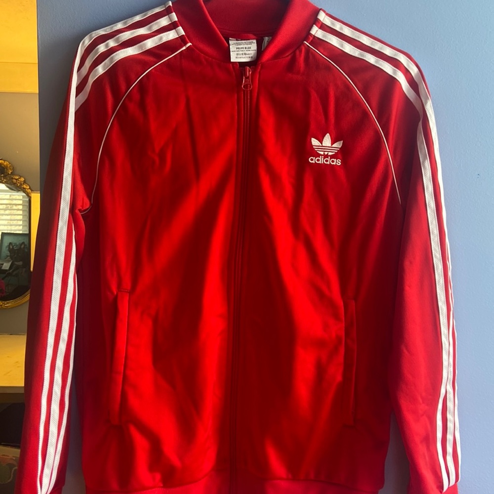 A red adidas jacket
